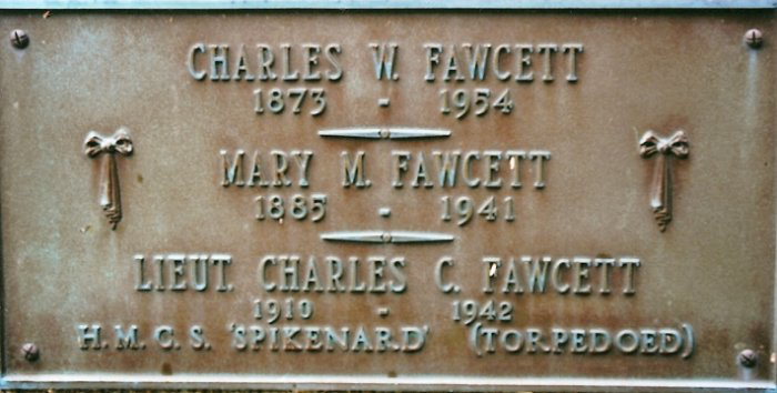 photograph of a plaque, reading CHARLES W. FAWCETT 1873–1954, MARY M. FAWCETT, 1885–1941, LIEUT. CHARLES C. FAWCETT, 1910–1942, H.M.C.S. ‘SPIKENARD’ (TORPEDOED)
